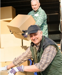 Moving team loading boxes